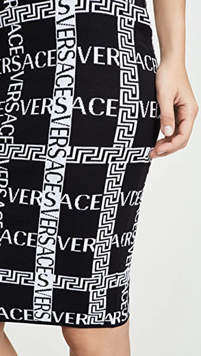 Shop Versace Logo Plaid Pencil Skirt In Black/white