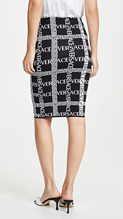 Shop Versace Logo Plaid Pencil Skirt In Black/white