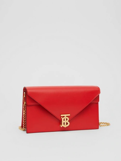 Shop Burberry Small Leather Tb Envelope Clutch In Bright Military Red