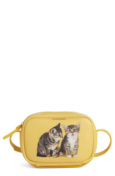 Shop Balenciaga Extra Small Kittens Calfskin Leather Camera Bag - Yellow In Jaune/ Noir