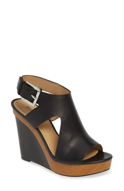 Shop Michael Michael Kors Josephine Wedge Sandal In Black Vachetta Leather