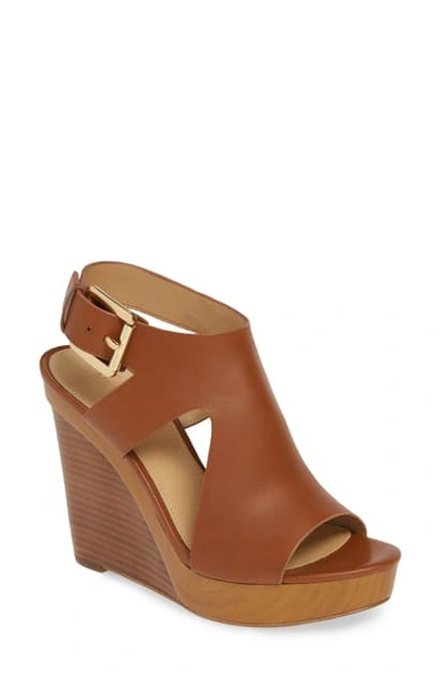 Shop Michael Michael Kors Josephine Wedge Sandal In Luggage Vachetta Leather