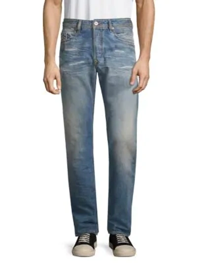 Shop Diesel Buster Distressed Straight Jeans In Denim
