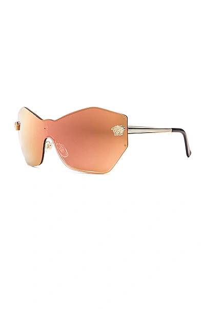 Shop Versace Mirrored Shield Sunglasses In Pink