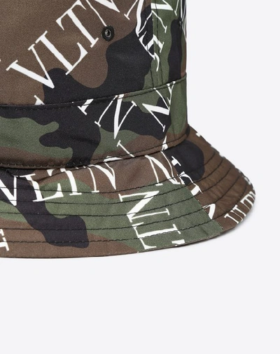 Shop Valentino Vltn Camouflage Bucket Hat In Military Green