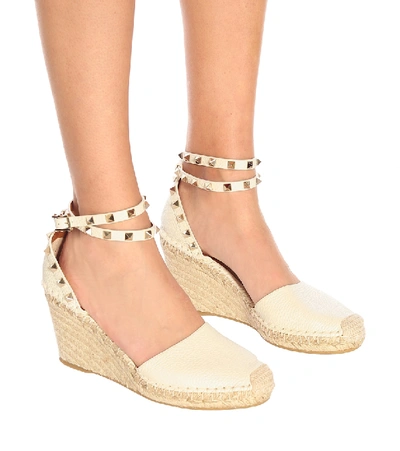 Shop Valentino Rockstud Double Leather Wedge Espadrilles In White