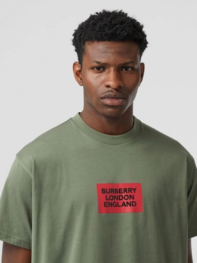 Shop Burberry Logo Print Cotton Oversized T-shirt In Dark Moss