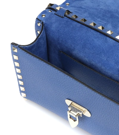 Shop Valentino Rockstud Small Leather Crossbody Bag In Blue