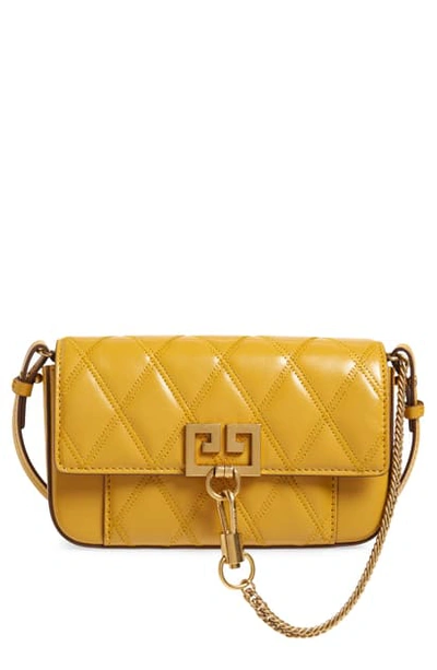 Shop Givenchy Mini Pocket Quilted Convertible Leather Bag - Yellow In Golden