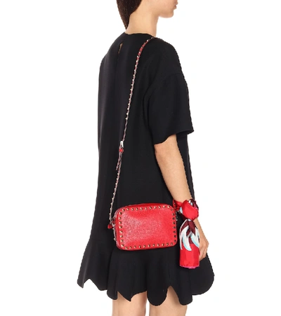 Shop Valentino Rockstud Leather Crossbody Bag In Red