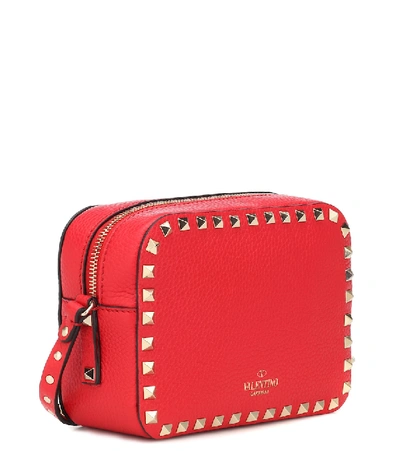 Shop Valentino Rockstud Leather Crossbody Bag In Red