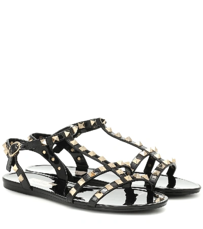 Shop Valentino Rockstud Pvc Sandals In Black