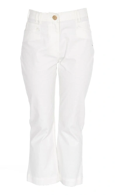 Shop Balmain Cropped Flare Jeans In White