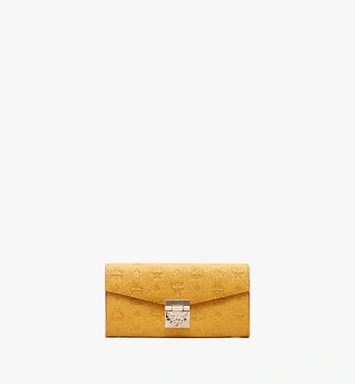 Shop Mcm Patricia Crossbody Wallet In Monogram Leather In Golden Mango