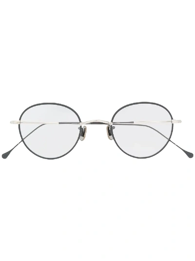 Shop Eyevan7285 Round Frame Glasses In Silver