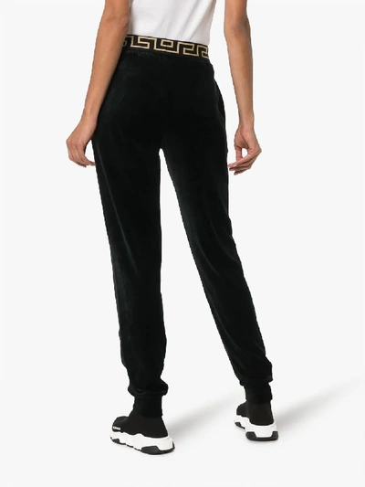 Shop Versace Greca Border Track Pants In Black