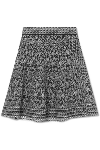 Shop Alaïa Jacquard-knit Wrap Mini Skirt In Black