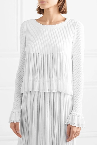 Shop Alaïa Ruffled Ribbed-knit Top In White