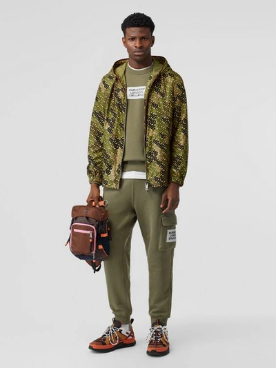 Shop Burberry Monogram Print Nylon Hooded Jacket In Khaki Green