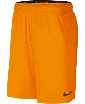 men orange nike shorts 