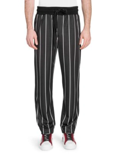 Shop Dolce & Gabbana Pinstripe Track Pants In Black White
