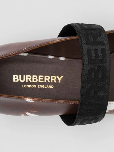 Shop Burberry Logo Detail Cow Print Leather Flats