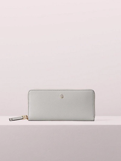 Shop Kate Spade Polly Slim Continental Wallet In Warm Taupe