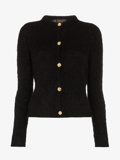 Shop Versace Gold Tone Button Knitted Cardigan In 101 - Black