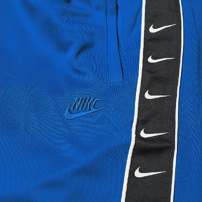 Nike Taped Poly Track Pant In Blue | ModeSens