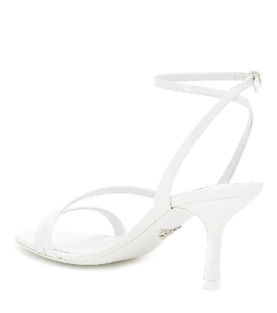 Shop Prada Patent Leather Sandals In White
