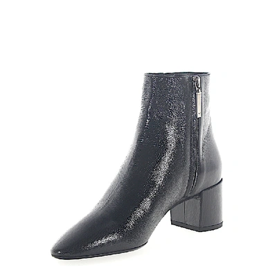 Shop Saint Laurent Ankle Boots Black Metal