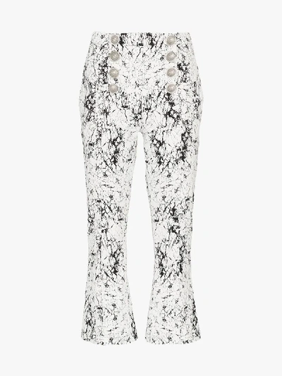 Shop Balmain High Waisted Cracked Cotton Jersey Trousers In Gab White