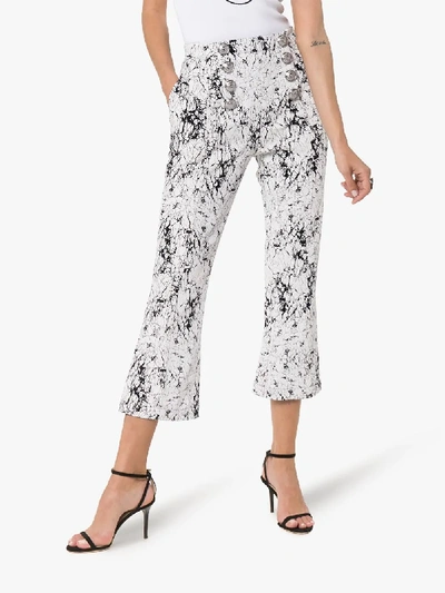 Shop Balmain High Waisted Cracked Cotton Jersey Trousers In Gab White