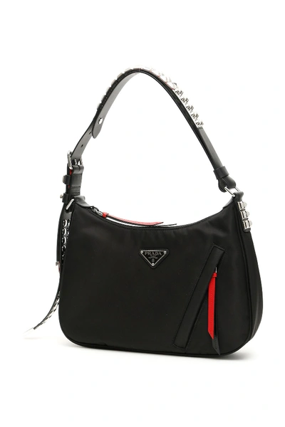 Shop Prada New Vela Hobo Bag In Nero Fuoco (black)