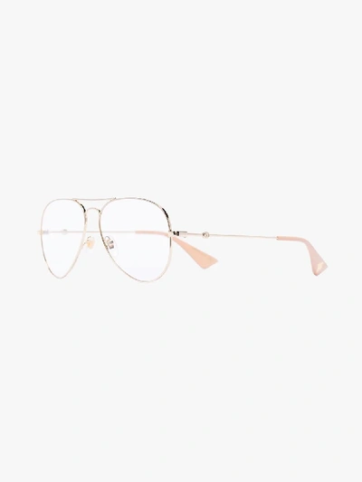 Shop Gucci Gold Tone Aviator Optical Glasses