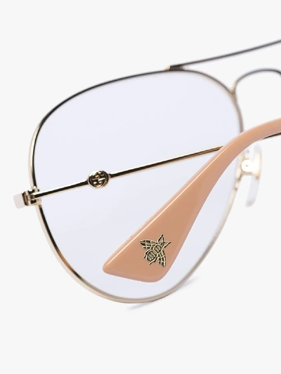 Shop Gucci Gold Tone Aviator Optical Glasses