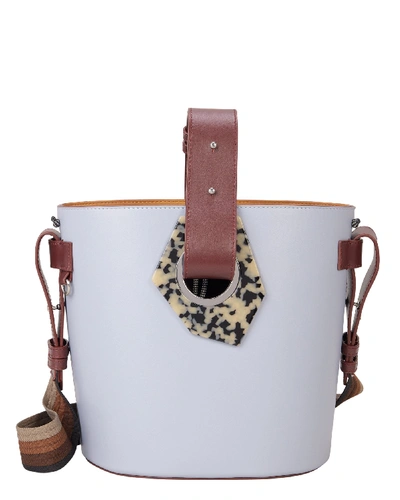 Shop Ganni Cylinder Bucket Bag In Periwinkle