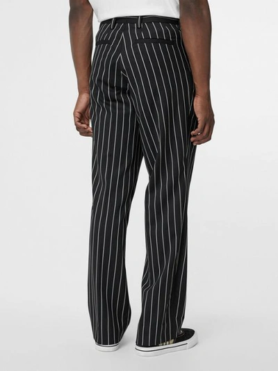 Shop Burberry Pinstriped Stretch Wool Wide-leg Tailored Trousers In Black