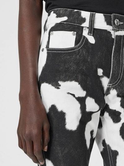 Shop Burberry Straight Fit Cow Print Jeans In Black