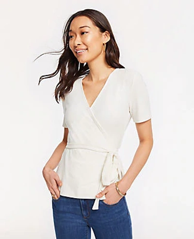 Shop Ann Taylor Petite Ribbed Knit Wrap Top In Winter White