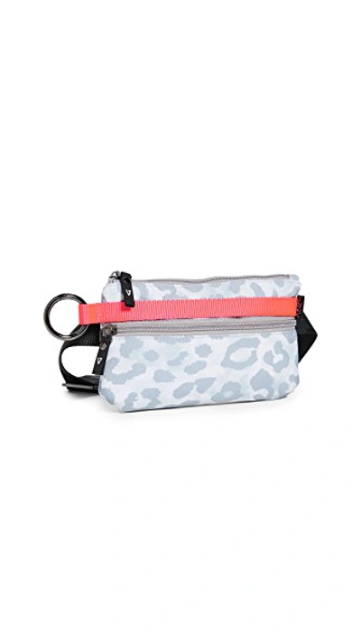 Shop Andi Urban Clutch Bag In White Leopard/pop Pink