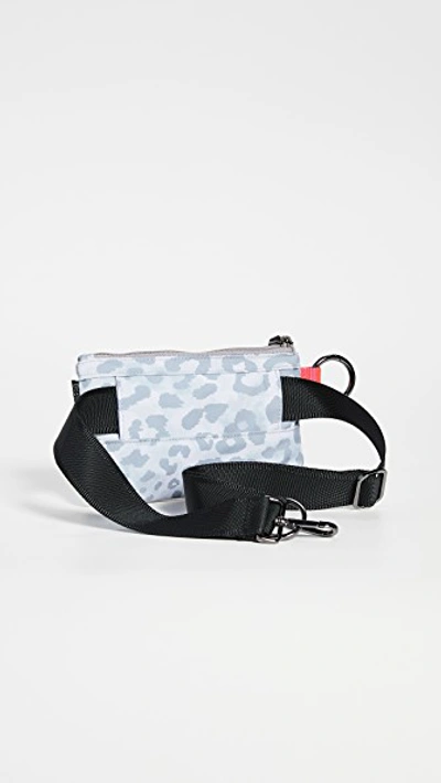 Shop Andi Urban Clutch Bag In White Leopard/pop Pink