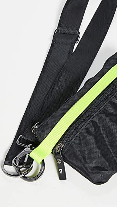 Shop Andi Urban Clutch Bag In Black Leopard/yellow
