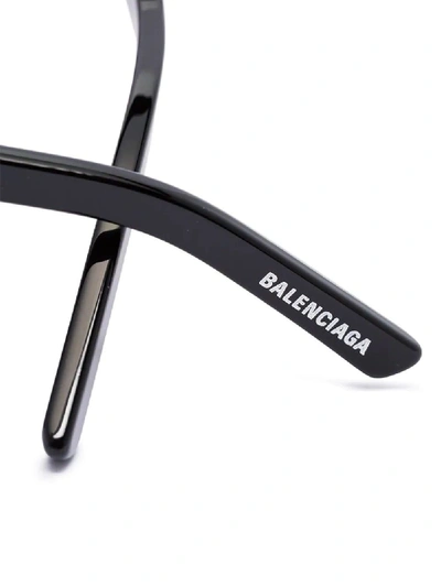Shop Balenciaga Round Logo Sunglasses