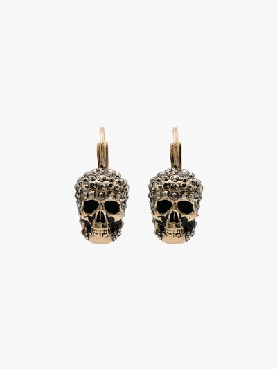 Shop Alexander Mcqueen Gold-tone Crystal Skull Earrings In Metallic