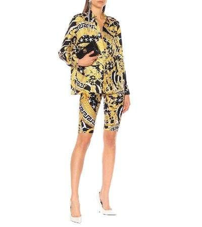 Shop Versace Printed Stretch-jersey Shorts In Yellow