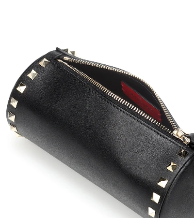 Shop Valentino Rockstud Leather Clutch In Black
