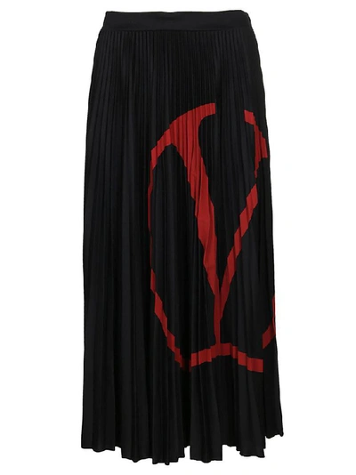 Shop Valentino Logo Print Pleated Midi Skirt In Black