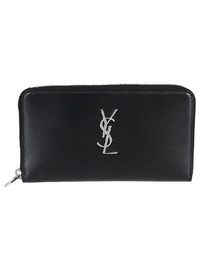 Shop Saint Laurent Monogram Zipped Wallet In Black