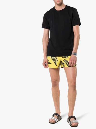 Shop Givenchy Logo Print Swim Shorts In Yellow